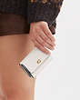 COACH®,ESSENTIAL MINI TRIFOLD WALLET,Polished Pebble Leather,Mini,Brass/Chalk,Detail View