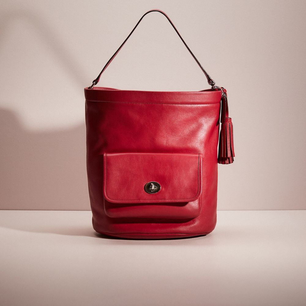The inside is re-designed with red textile lining and legacy