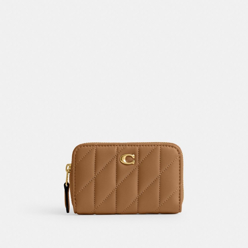 Shop Coach Essential Kleines Kartenetui Mit Rundumreissverschluss Und Bauschiger Steppung In Brass/honey Brown