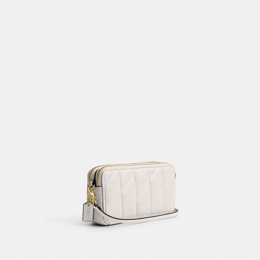 COACH®,KIRA CROSSBODY BAG WITH PILLOW QUILTING,Nappa leather,Mini,Brass/Chalk,Angle View