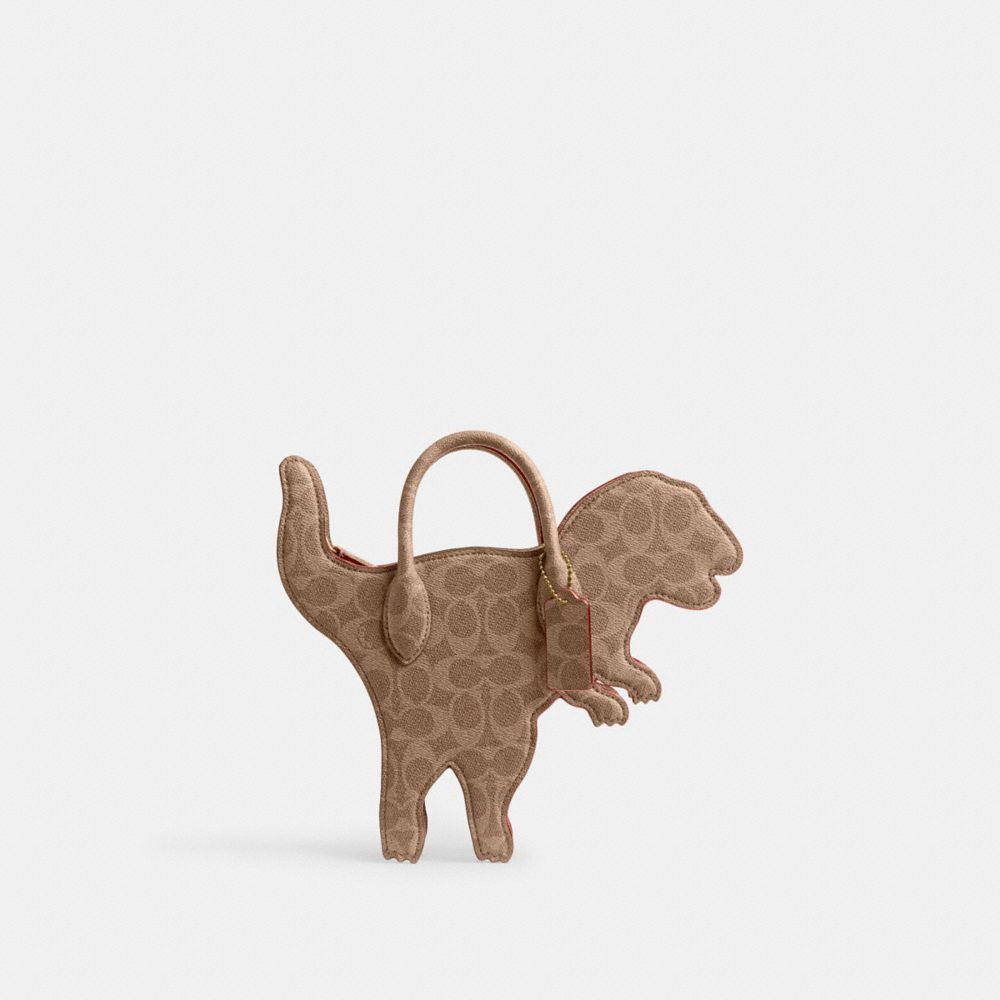 COACH®  Rexy Sled Bag Charm In Signature Canvas