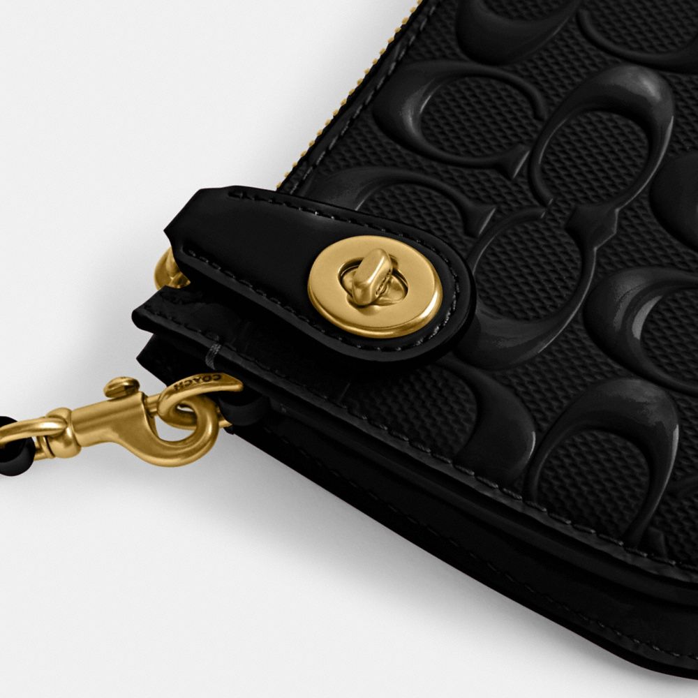 Coach black hot sale embossed bag