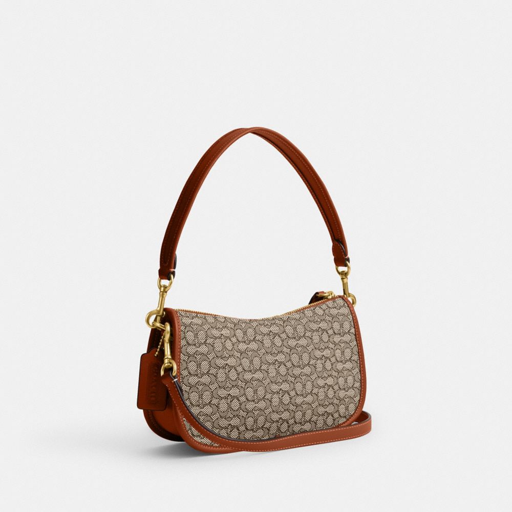 COACH®,Swinger Bag In Micro Signature Jacquard,,Angle View