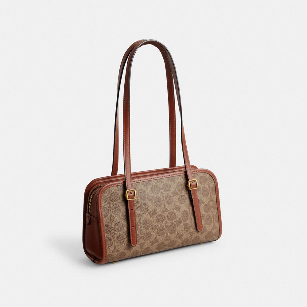 COACH®,Swing Zip Bag In Signature Canvas,,Angle View