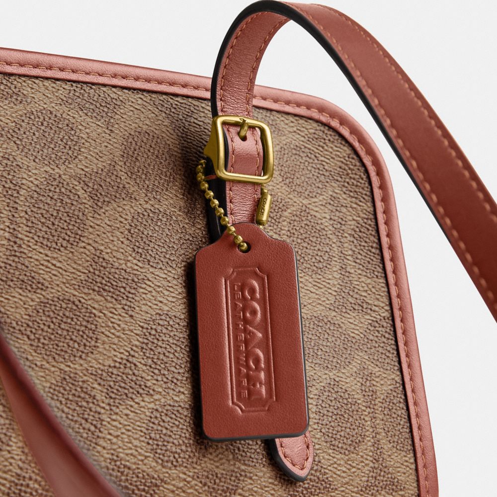 COACH®,Swing Zip Bag In Signature Canvas,,Closer View