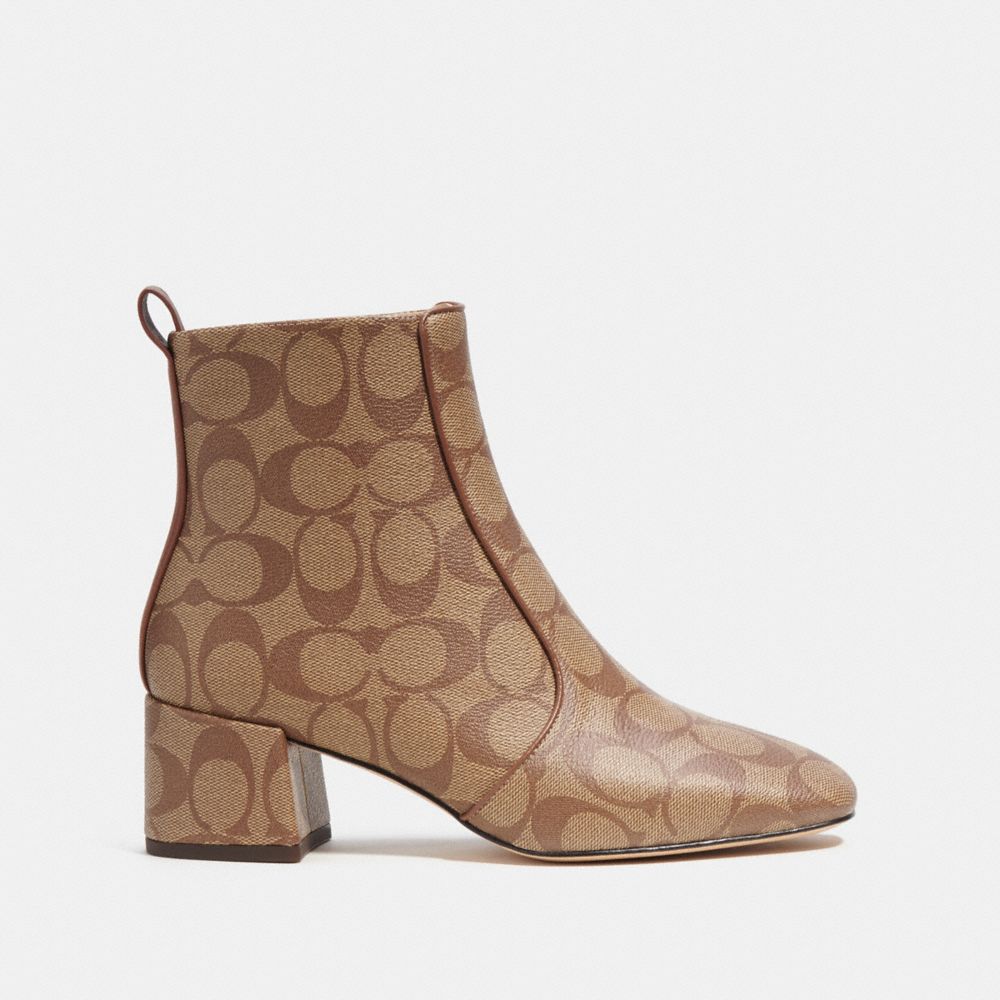 COACH®,NOAH BOOTIE IN SIGNATURE CANVAS,Signature Coated Canvas,Khaki/Saddle,Angle View