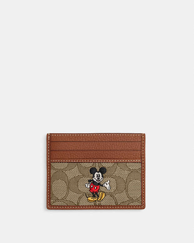 COACH disney x Slim Id Card Case In Signature Jacquard With Mickey Mouse  Print - Brass/Khaki Multi
