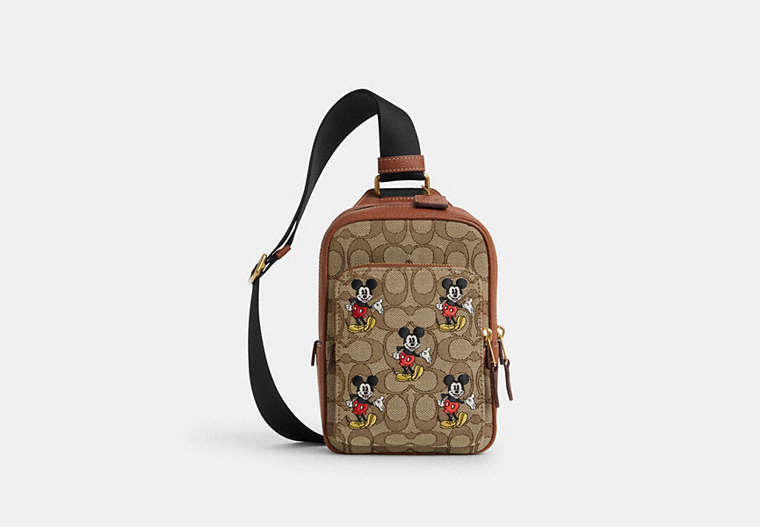 COACH®,DISNEY X COACH TRACK PACK 14 IN SIGNATURE JACQUARD WITH MICKEY MOUSE PRINT,Jacquard,Mini,Brass/Khaki Multi,Front View image number 0