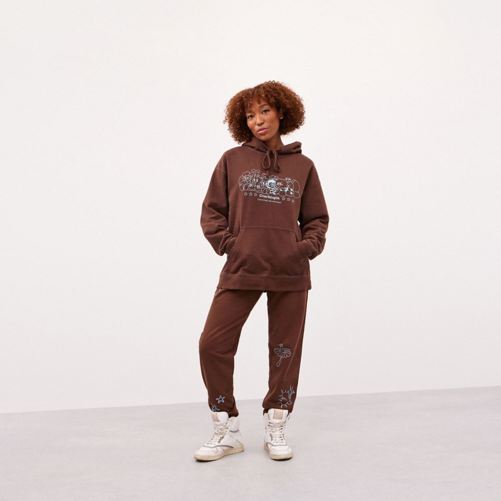 COACH®,Pantalon de jogging graphique 93 % coton recyclé,99 % laine recyclée, 1 % autres fibres,Brun sombre,Scale View