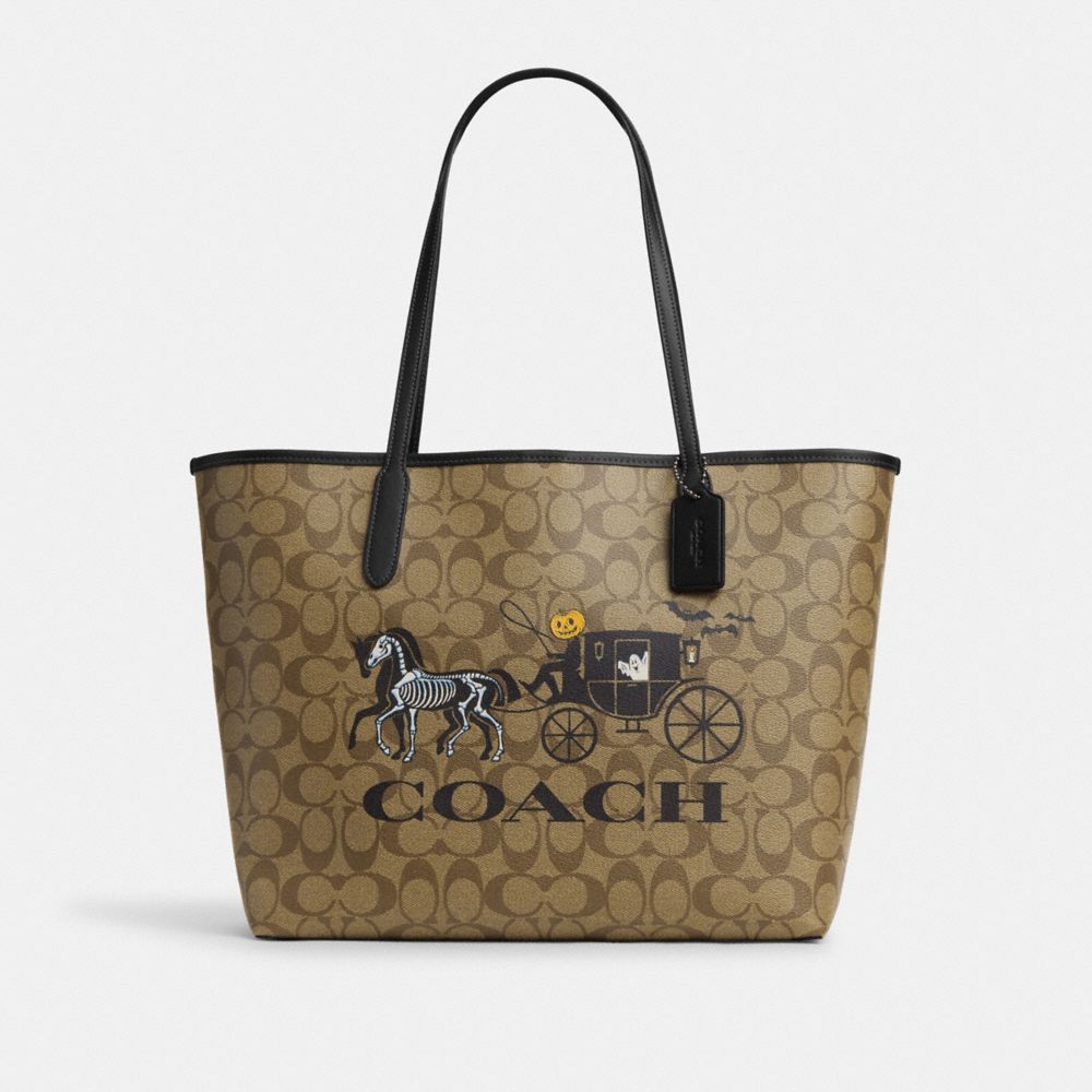 COACH®,CITY TOTE BAG IN SIGNATURE CANVAS WITH HALLOWEEN HORSE AND CARRIAGE,Signature Canvas,X-Large,Black Copper/Khaki Black Multi,Front View