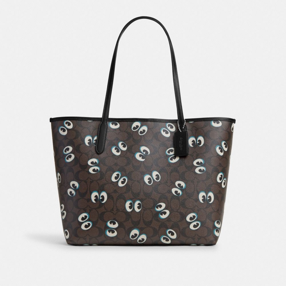 COACH®,CITY TOTE BAG IN SIGNATURE CANVAS WITH HALLOWEEN EYES,Signature Canvas,X-Large,Silver/Brown Black Multi,Front View