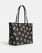 COACH®,CITY TOTE IN SIGNATURE CANVAS WITH HALLOWEEN EYES,pvc,X-Large,Silver/Brown Black Multi,Angle View