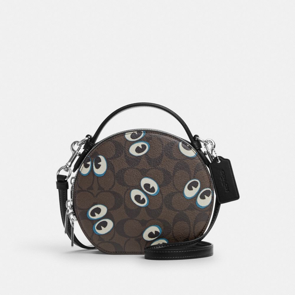 COACH®,CANTEEN CROSSBODY BAG IN SIGNATURE CANVAS WITH HALLOWEEN EYES,Signature Canvas,Small,Silver/Brown Black Multi,Front View
