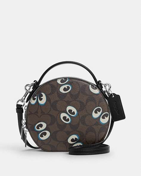 COACH®,CANTEEN CROSSBODY IN SIGNATURE CANVAS WITH HALLOWEEN EYES,pvc,Silver/Brown Black Multi,Front View