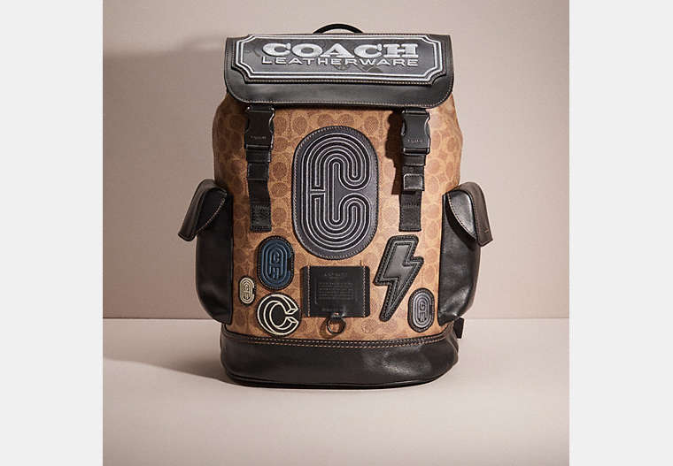 COACH®,UPCRAFTED RIVINGTON BACKPACK IN SIGNATURE CANVAS,Black Copper/Khaki,Front View
