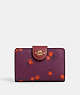 COACH®,MEDIUM CORNER ZIP WALLET WITH COUNTRY FLORAL PRINT,Mixed Material,Mini,Gold/Deep Berry Multi,Front View