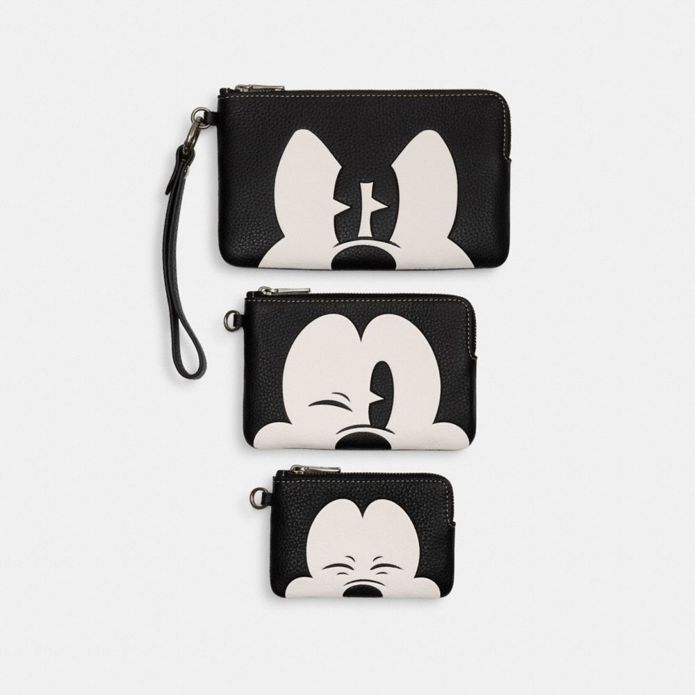 【新品未使用 送料無料】COACH×Disney ミッキー  ストラップ付ポーチジップトップ開閉裏地付き