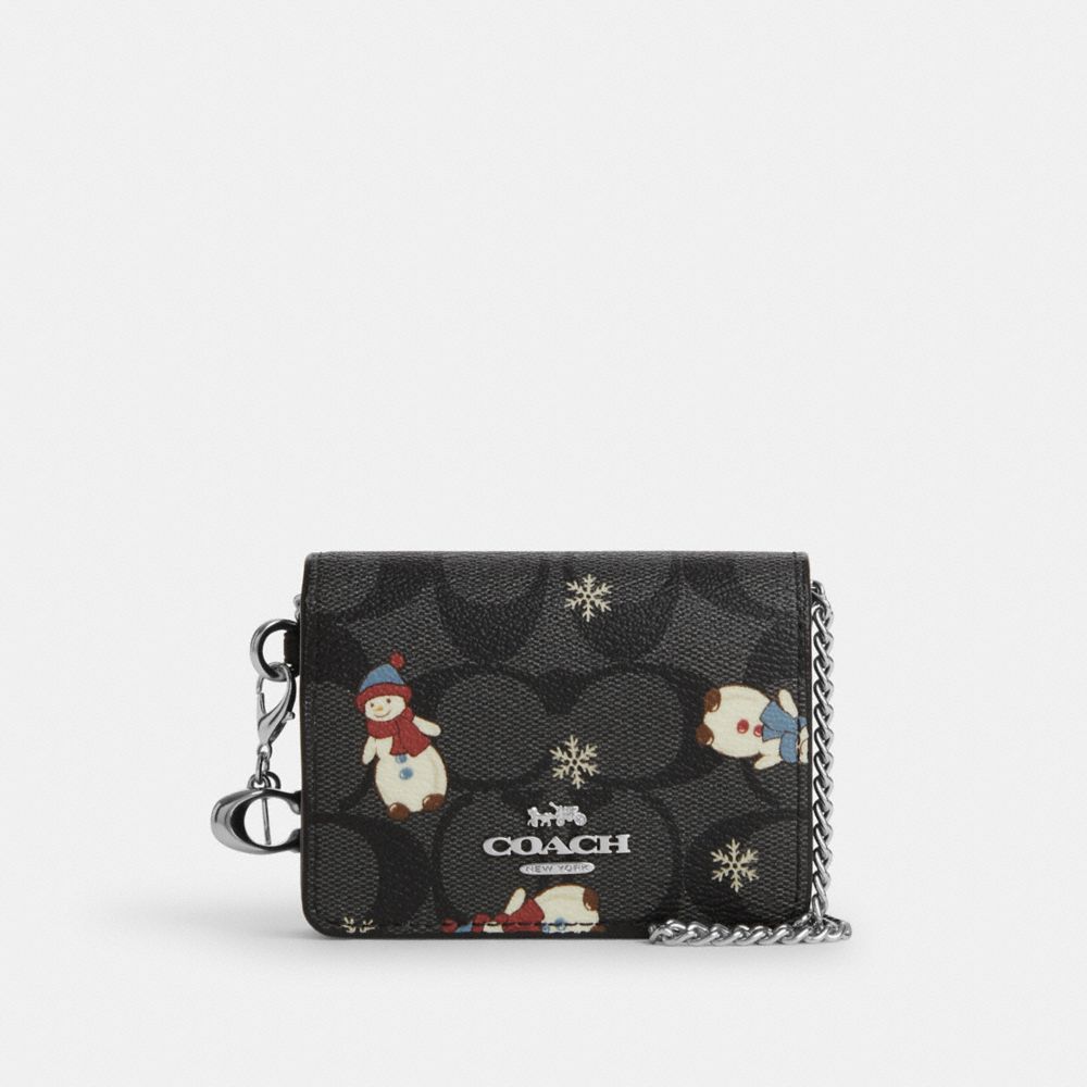 COACH®,BOXED MINI WALLET ON A CHAIN IN SIGNATURE CANVAS WITH SNOWMAN PRINT,Signature Canvas,Mini,Silver/Graphite/Black Multi,Front View