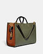 COACH®,ROGUE 39 IN COLORBLOCK,Pebble Leather,X-Large,Brass/Army Green Multi,Angle View