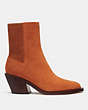 COACH®,PRESTYN BOOTIE,Suede,Burnished Amber,Angle View
