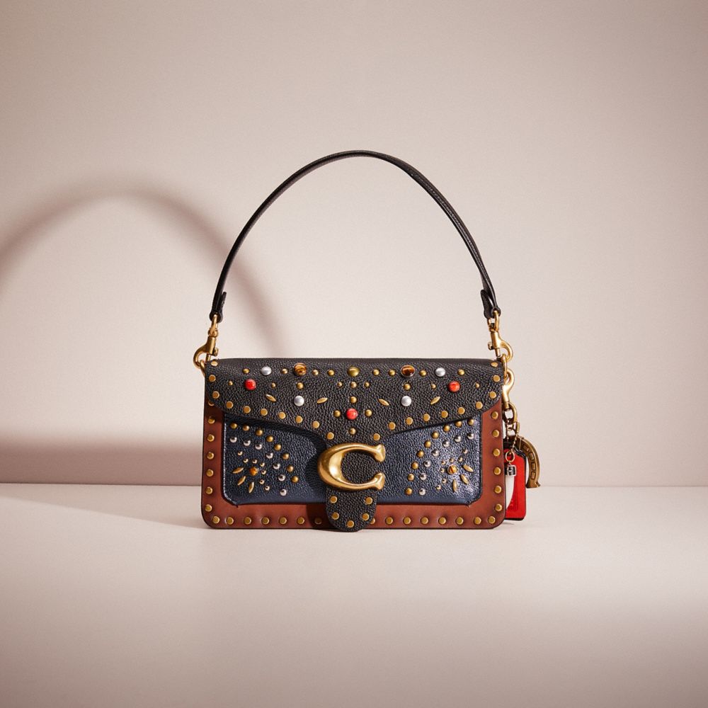 Coach border rivets discount leather shoulder bag