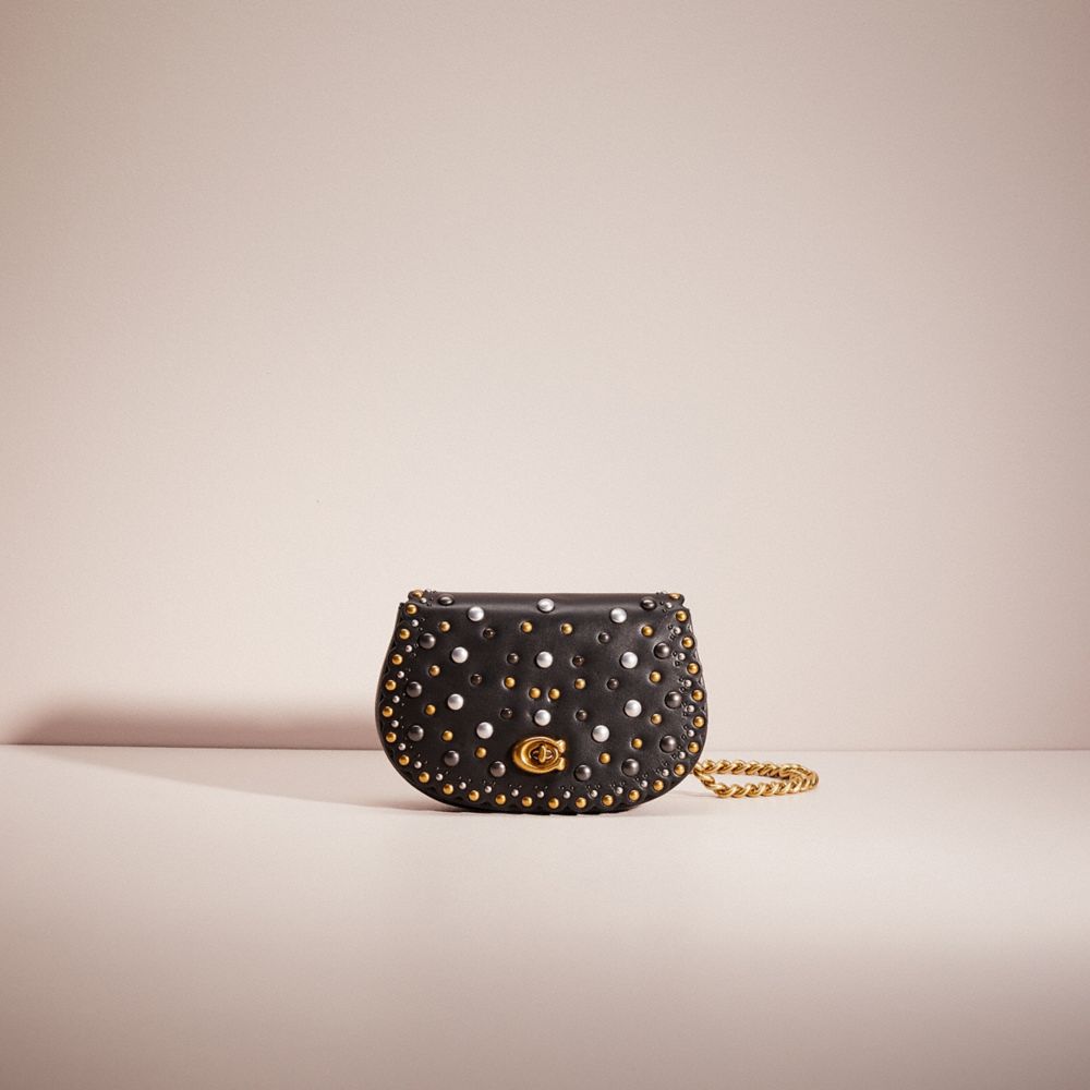 Coach scallop online rivets