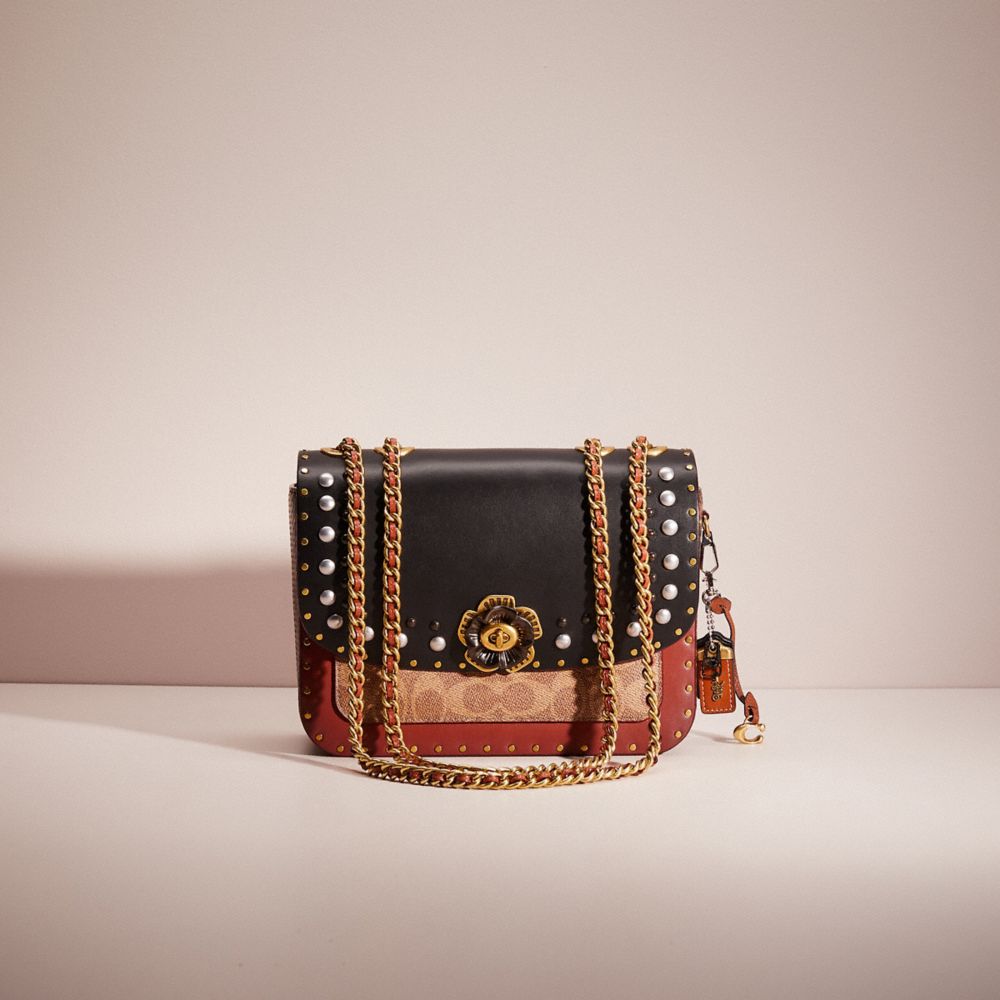 Coach best sale border rivets