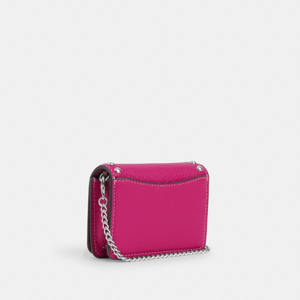 COACH®,MINI WALLET ON A CHAIN WITH RIVETS,Novelty Leather,Mini,Silver/Cerise,Angle View