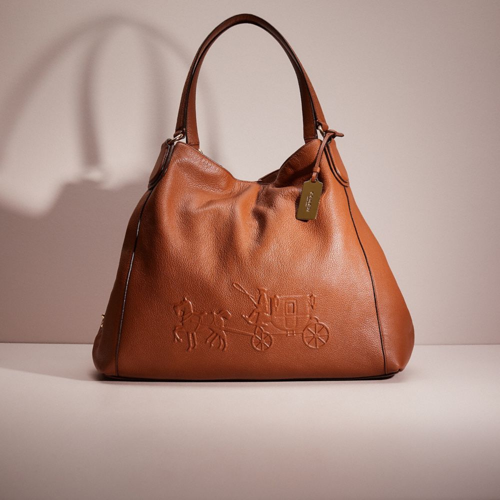 COACH®: Embossed Horse And Carriage Large Edie Shoulder Bag In Pebble  Leather