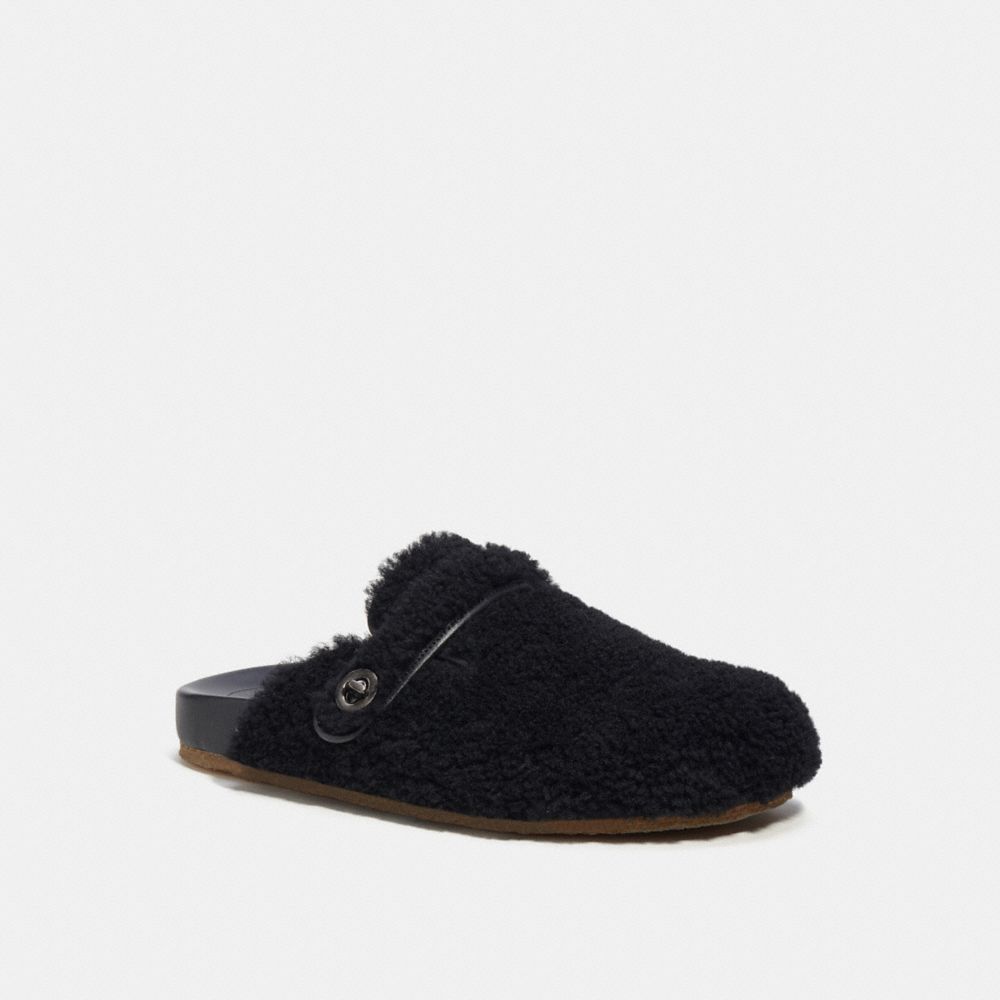 Shop Coach Outlet Clog In Shearling In Black