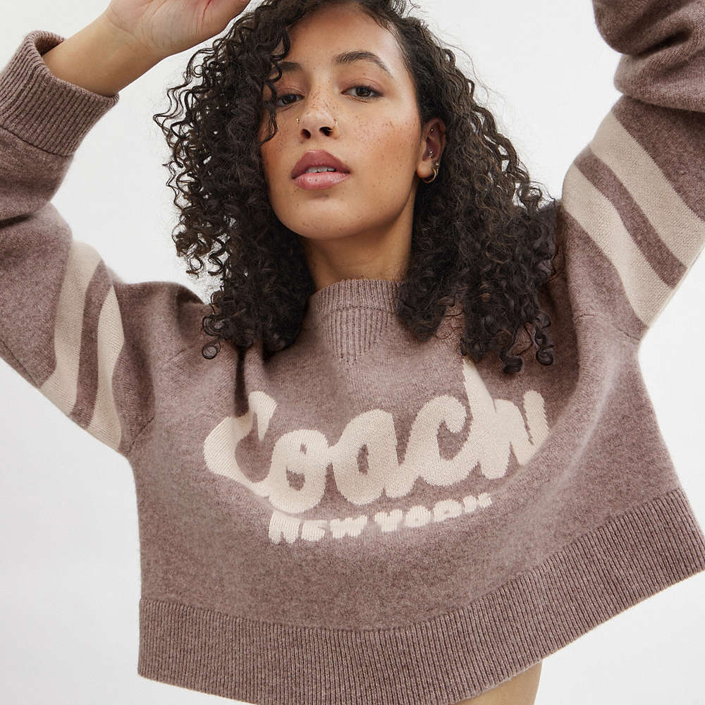 Shop Coach Cropped  Sweater In Pink