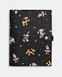 COACH®,DISNEY X COACH NOTEBOOK WITH HOLIDAY PRINT,Other,Gunmetal/Black Multi,Front View