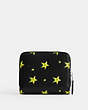 COACH®,COSMIC COACH BILLFOLD WALLET WITH STAR PRINT,Polished Pebble Leather,Silver/Black,Back View