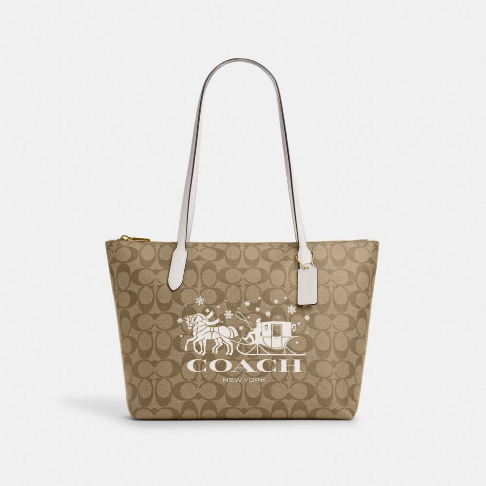 COACH®,ZIP TOP TOTE BAG IN SIGNATURE CANVAS WITH HORSE AND SLEIGH,Signature Canvas,Medium,Gold/Khaki/Chalk,Front View