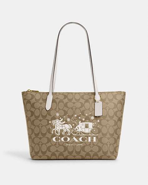 COACH®,ZIP TOP TOTE BAG IN SIGNATURE CANVAS WITH HORSE AND SLEIGH,Coated Canvas,Medium,Gold/Khaki/Chalk,Front View