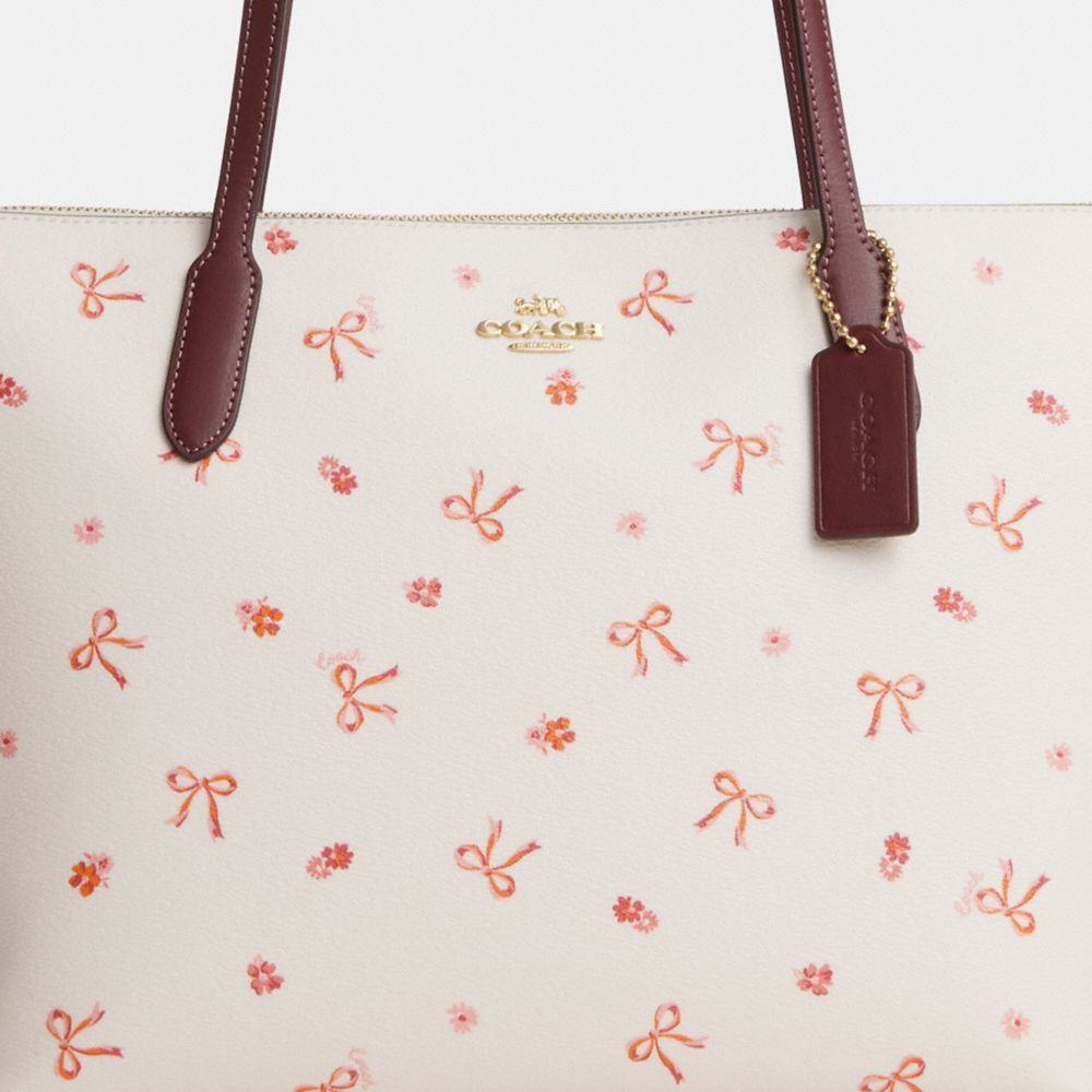 COACH®,Zip Top Tote Bag With Bow Print,