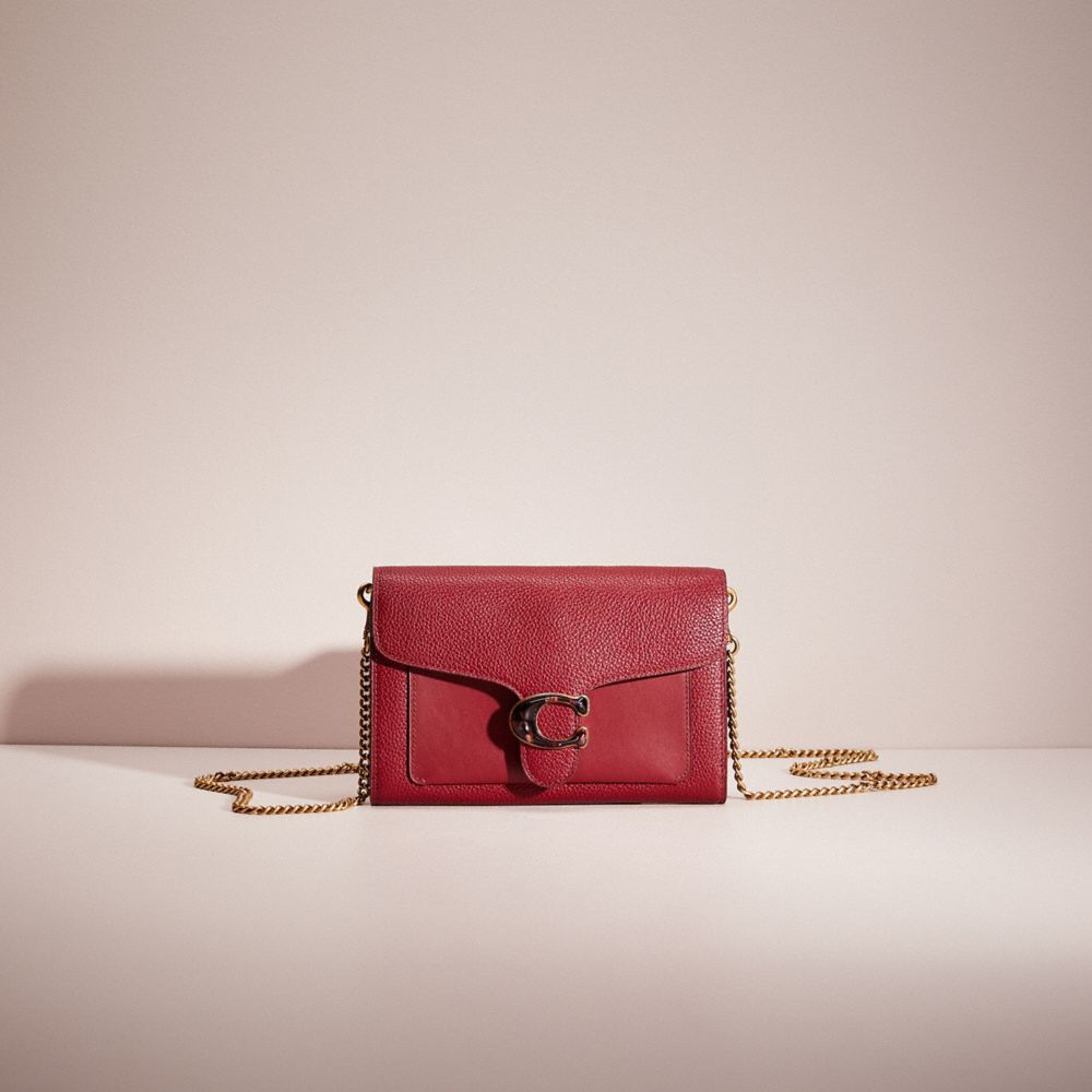 restored-tabby-chain-clutch-coach