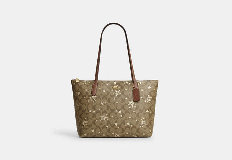 COACH®,ZIP TOP TOTE IN SIGNATURE CANVAS WITH STAR AND SNOWFLAKE PRINT,Coated Canvas,Large,Im/Khaki Saddle/Gold Multi,Front View