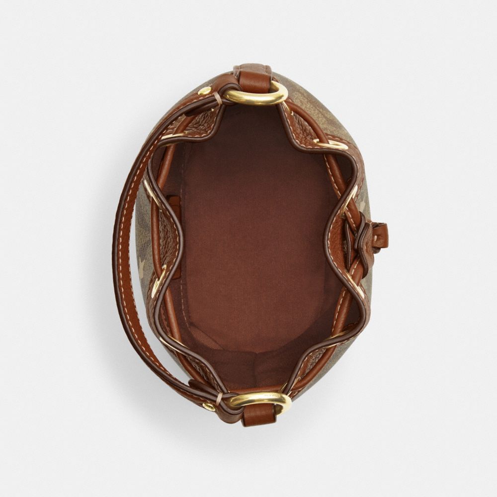 COACH®,Dempsey Drawstring Bucket Bag 15 In Signature Canvas With Star And Snowflake Print,,Inside View,Top View
