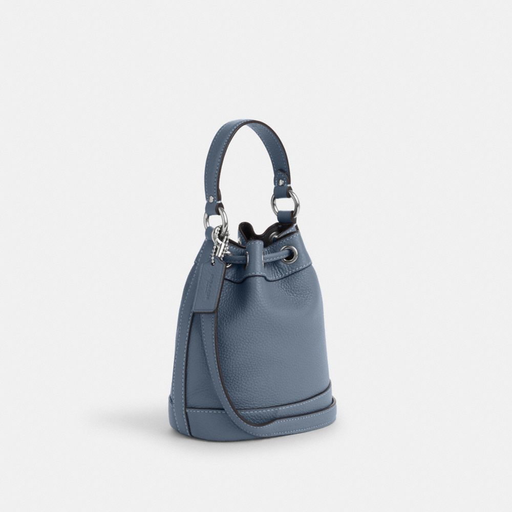 COACH®,DEMPSEY DRAWSTRING BUCKET BAG 15,Pebbled Leather,Medium,Silver/Light Mist,Angle View