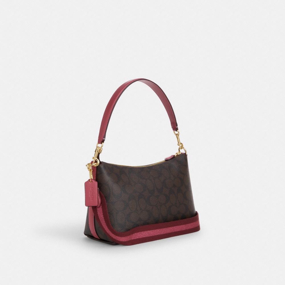COACH®,CLARA SHOULDER BAG IN SIGNATURE CANVAS WITH HORSE AND SLEIGH,Signature Canvas,Medium,Im/Brown/Rouge,Angle View