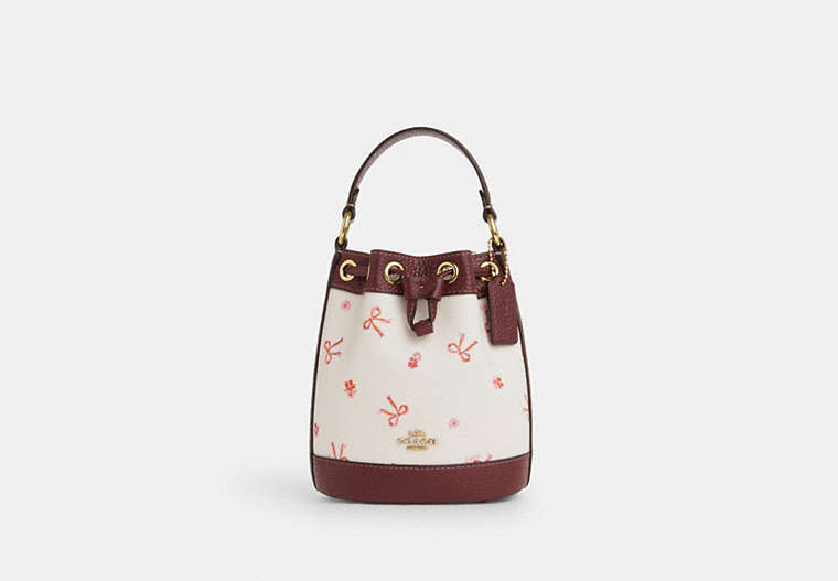COACH®,DEMPSEY DRAWSTRING BUCKET BAG 15 WITH BOW PRINT,Coated Canvas,Medium,Im/Chalk/Wine Multi,Front View image number 0