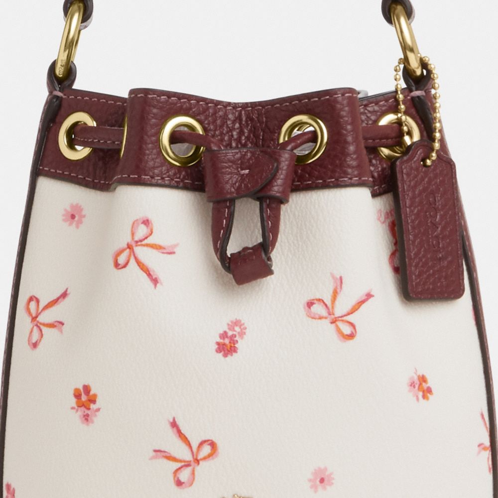 COACH®,Dempsey Drawstring Bucket Bag 15 With Bow Print,