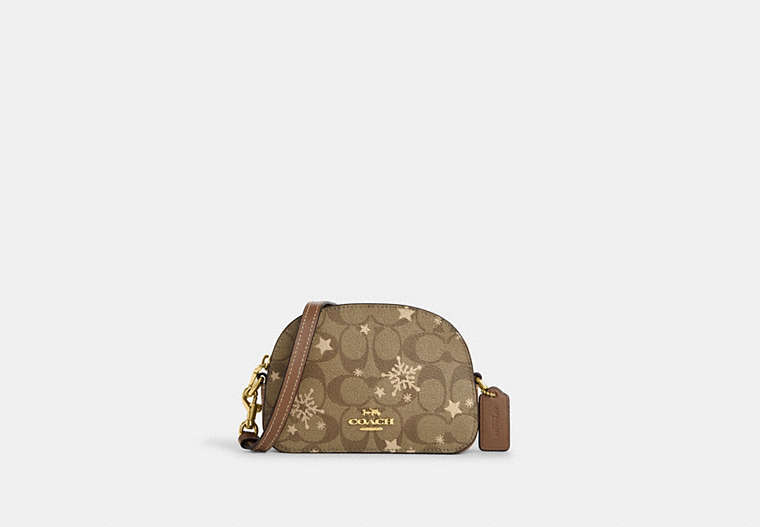 COACH®,MINI SERENA SATCHEL IN SIGNATURE CANVAS WITH STAR AND SNOWFLAKE PRINT,Coated Canvas,Mini,Im/Khaki Saddle/Gold Multi,Front View image number 0