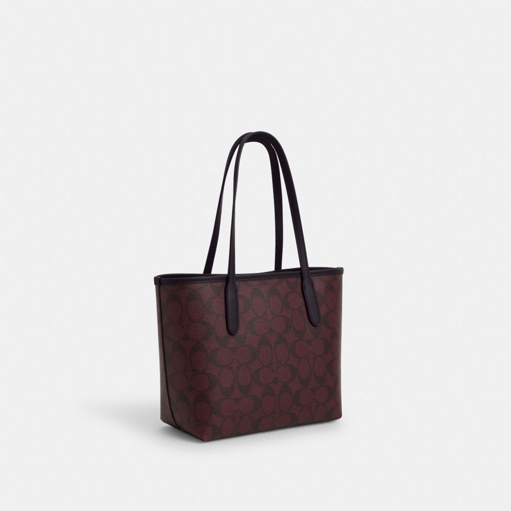 COACH®,MINI CITY TOTE IN SIGNATURE CANVAS,Signature Canvas,Medium,Gold/Oxblood Multi,Angle View