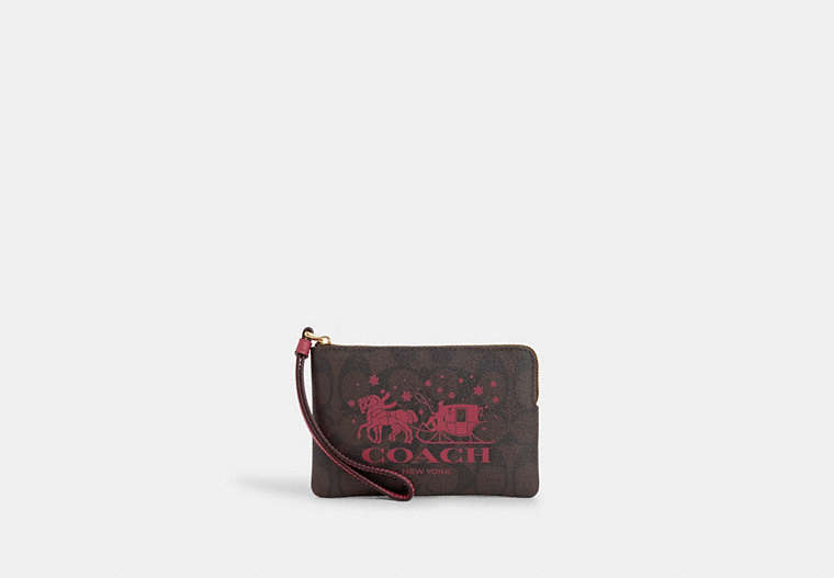 COACH®,CORNER ZIP WRISTLET IN SIGNATURE CANVAS WITH HORSE AND SLEIGH,Coated Canvas,Mini,Im/Brown/Rouge,Front View