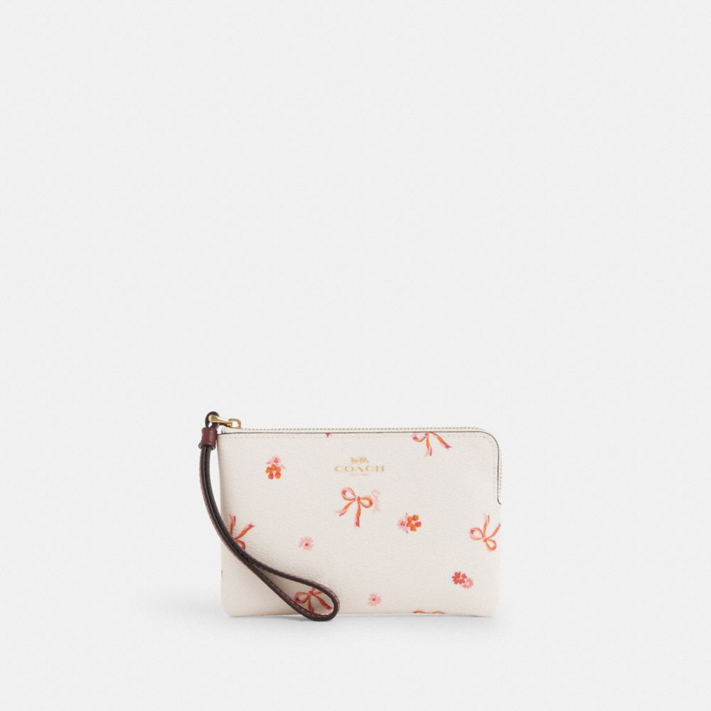 COACH®,CORNER ZIP WRISTLET WITH BOW PRINT,Novelty Print,Mini,Im/Chalk/Wine Multi,Front View