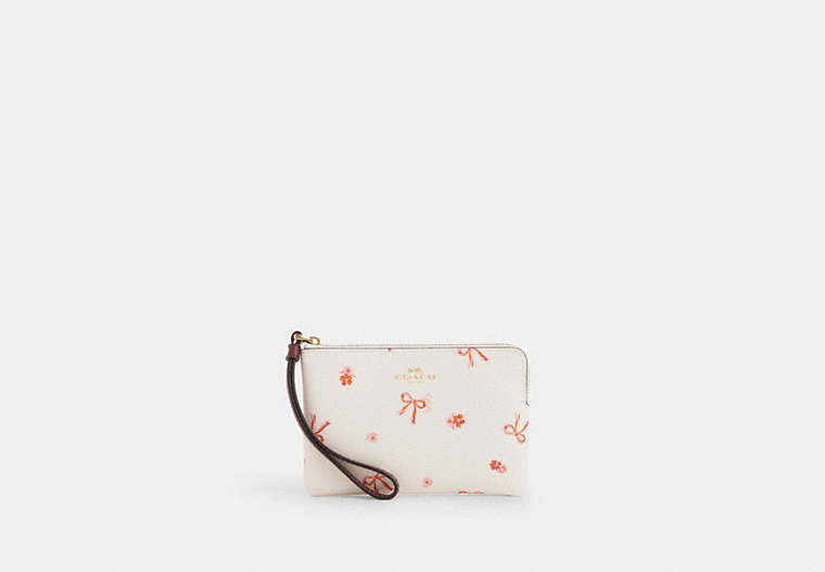 COACH®,CORNER ZIP WRISTLET WITH BOW PRINT,Coated Canvas,Im/Chalk/Wine Multi,Front View image number 0