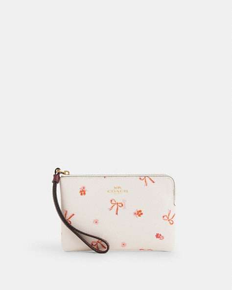 COACH®,CORNER ZIP WRISTLET WITH BOW PRINT,Coated Canvas,Im/Chalk/Wine Multi,Front View