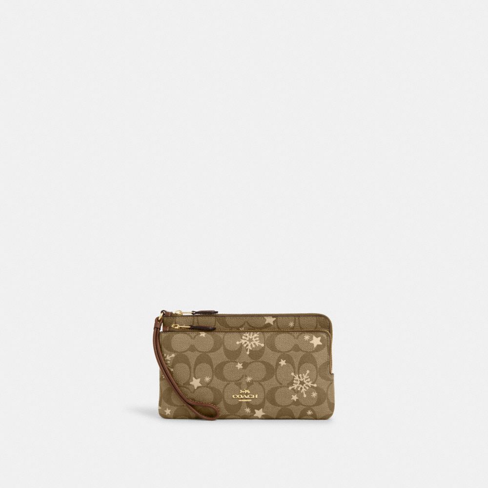 COACH®  Double Zip Wallet In Signature Canvas With Star And Snowflake Print